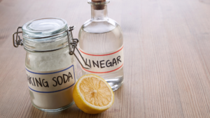 vinegar and baking soda are prepared for laundry
