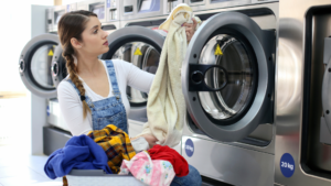 woman uses laundry services in Boston