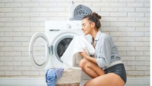 woman enjoys laundry service in Boston
